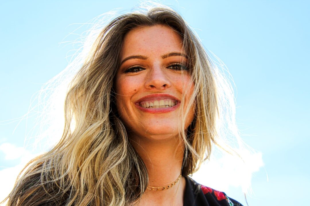 Portrait of a smiling woman with blonde hair